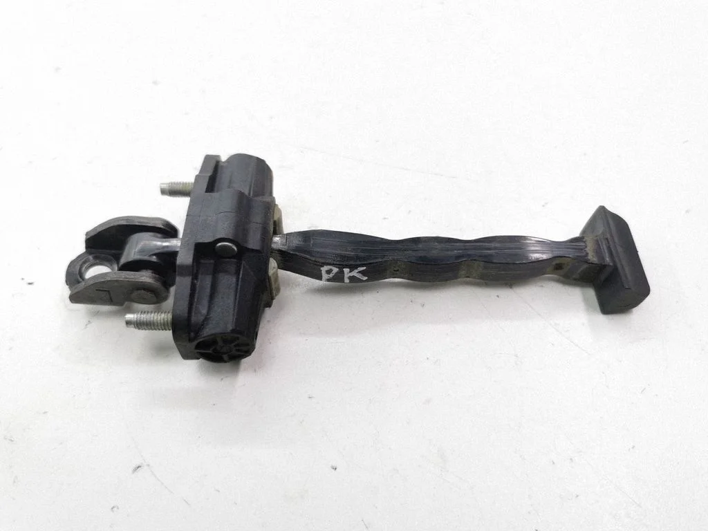 Front door check strap stopper – left