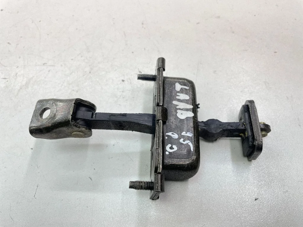 Front door check strap stopper – right