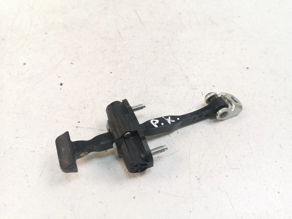 Front door check strap stopper – left