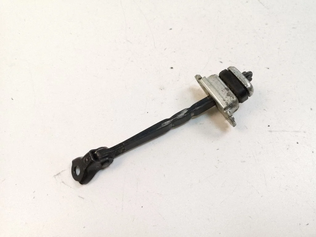 Front door check strap stopper