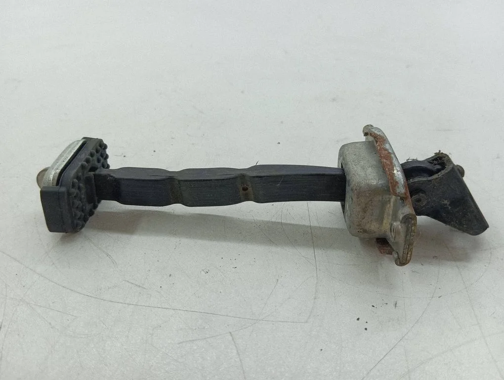 Front door check strap stopper – right