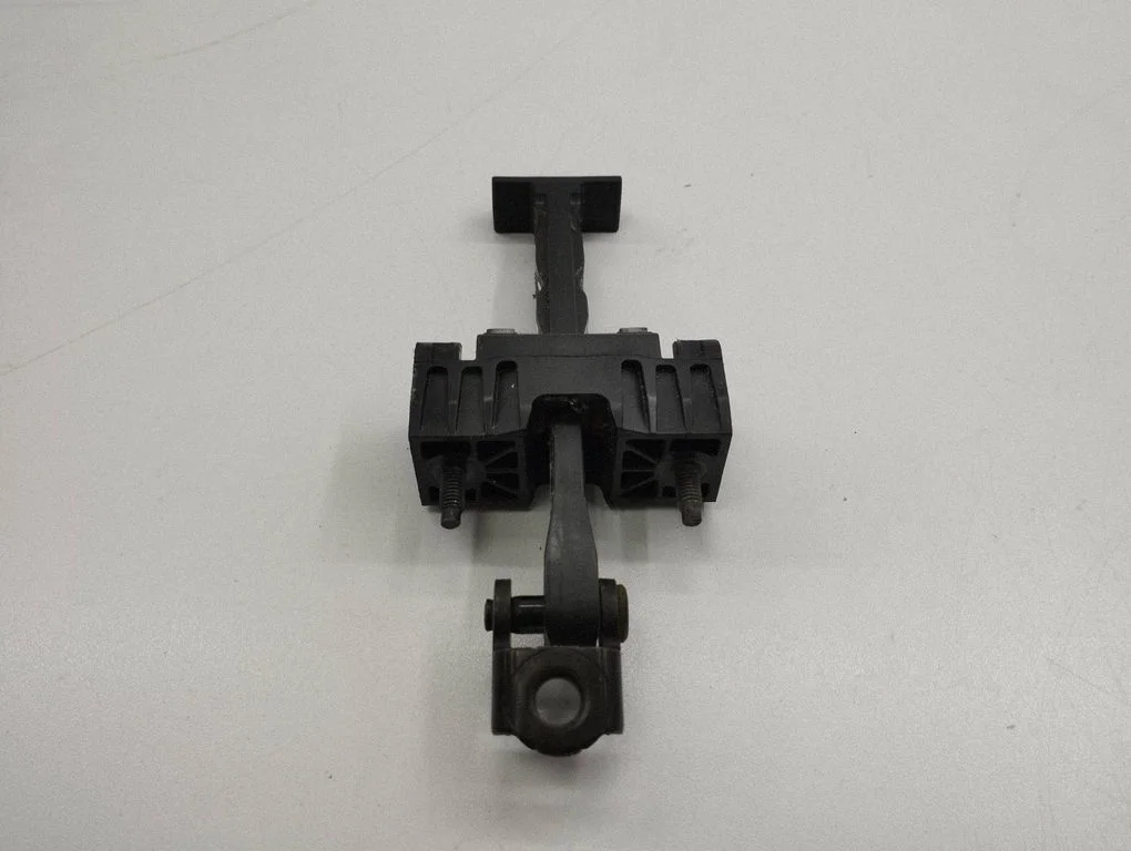 Front door check strap stopper – left