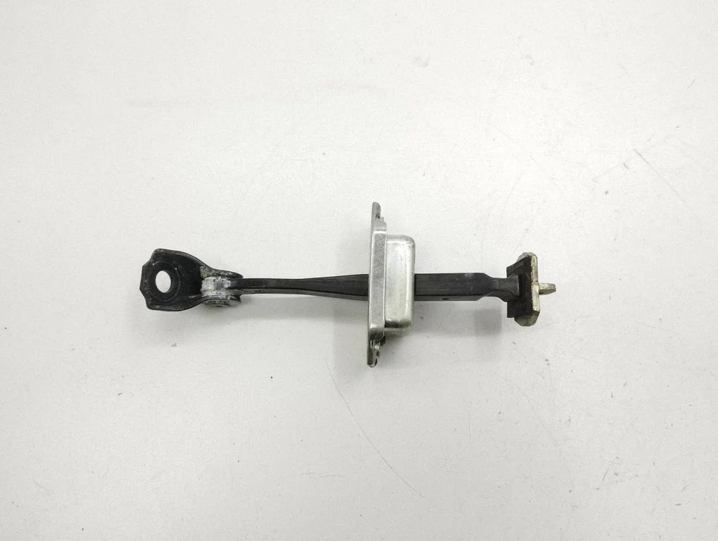 Front door check strap stopper – left