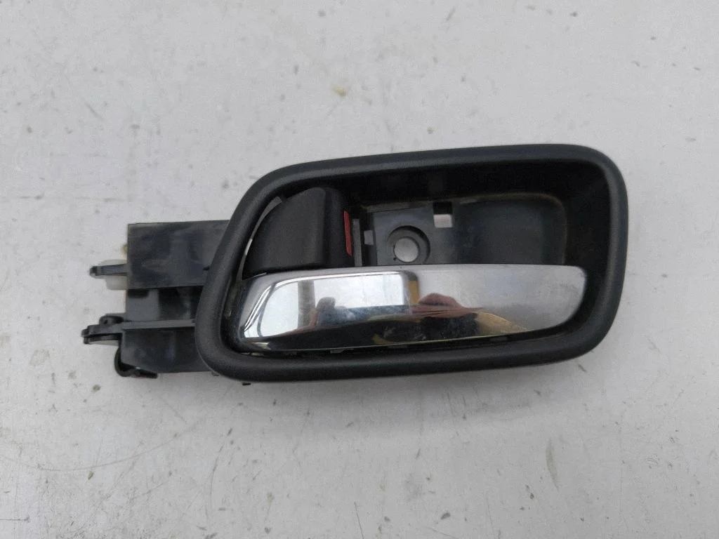 Front door interior handle – left