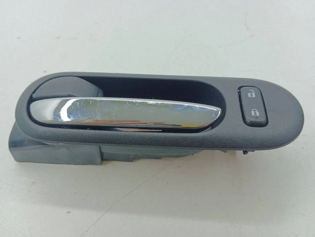 Front door interior handle – left