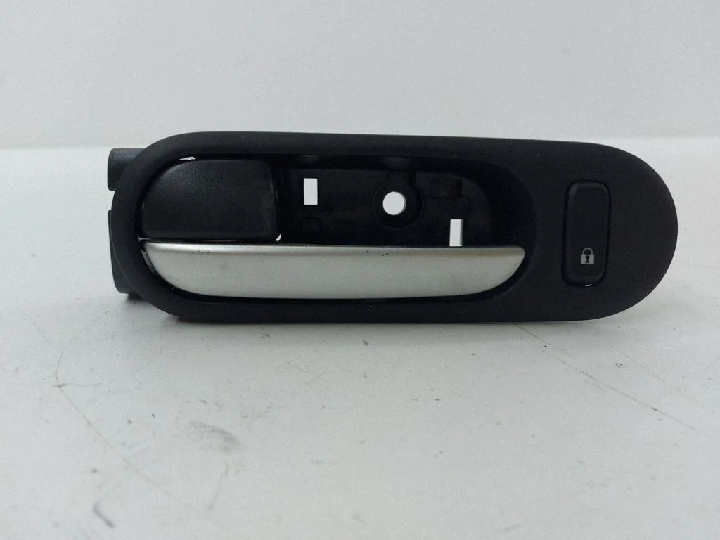 Front door interior handle – left