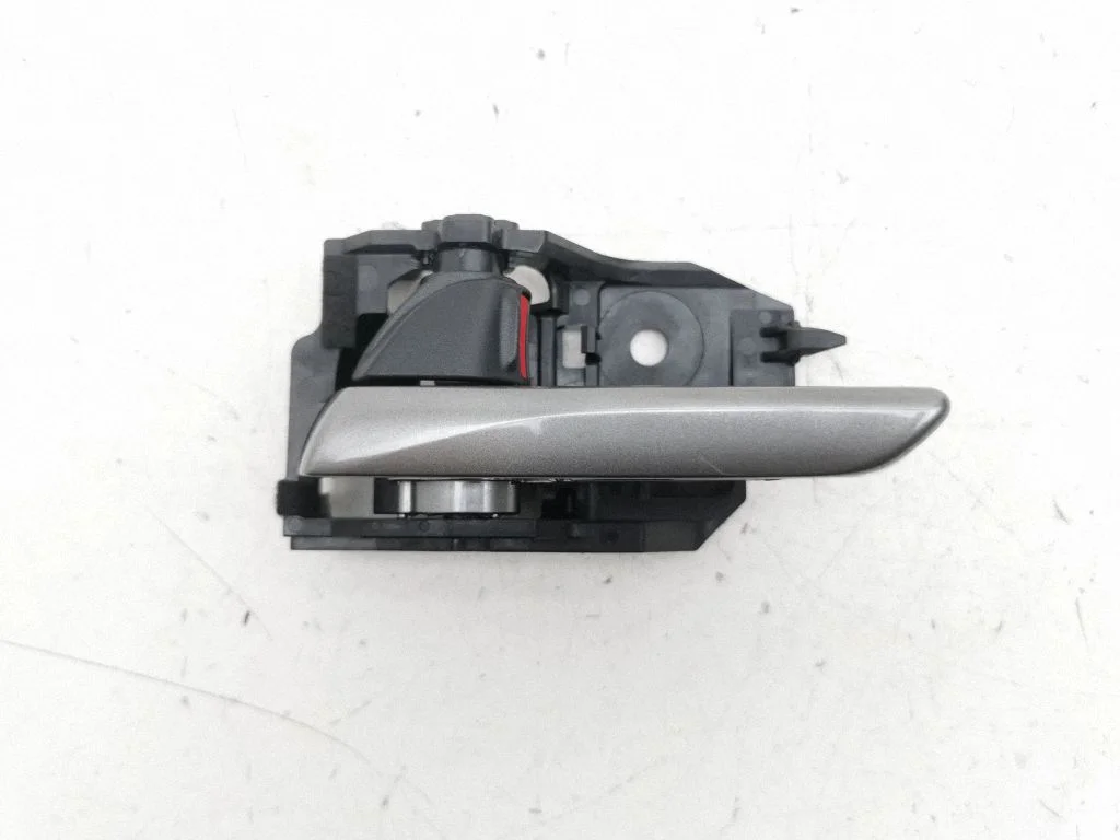 Front door interior handle – left