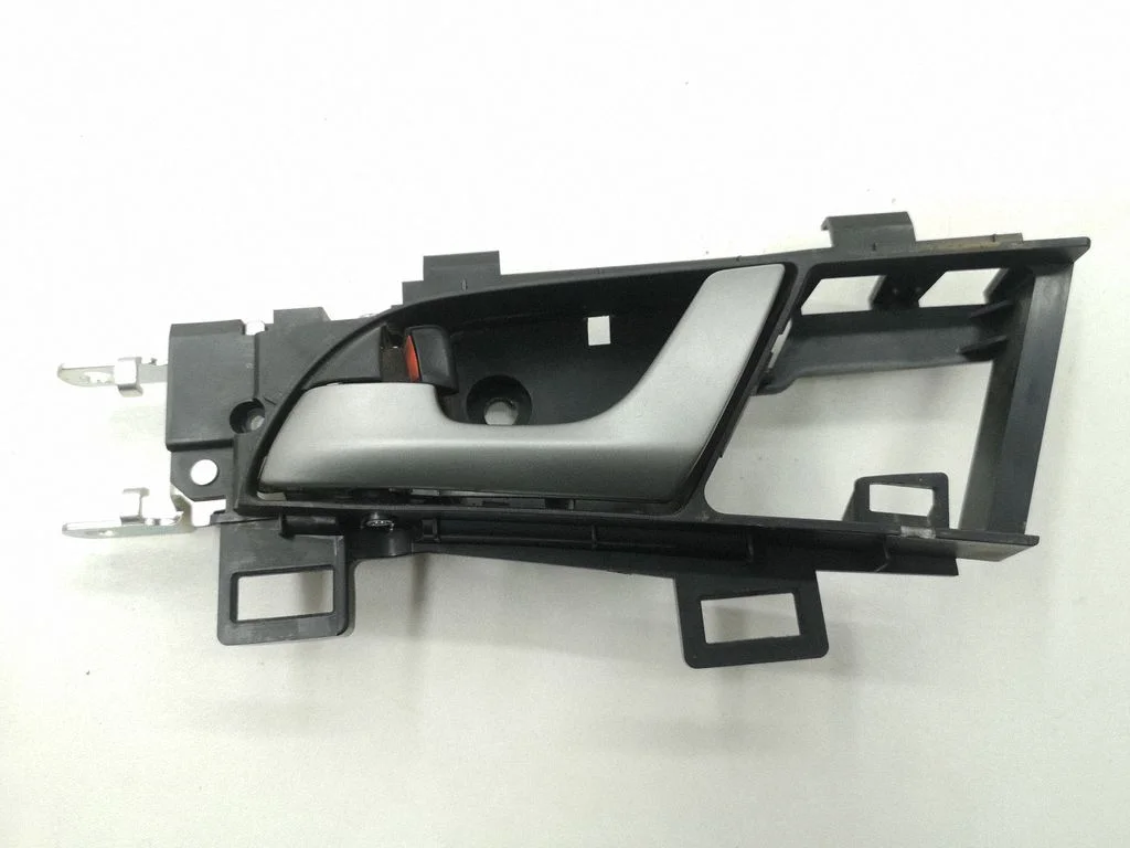 Front door interior handle – left