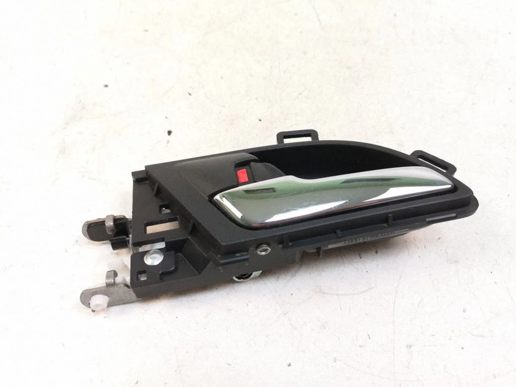Front door interior handle – left