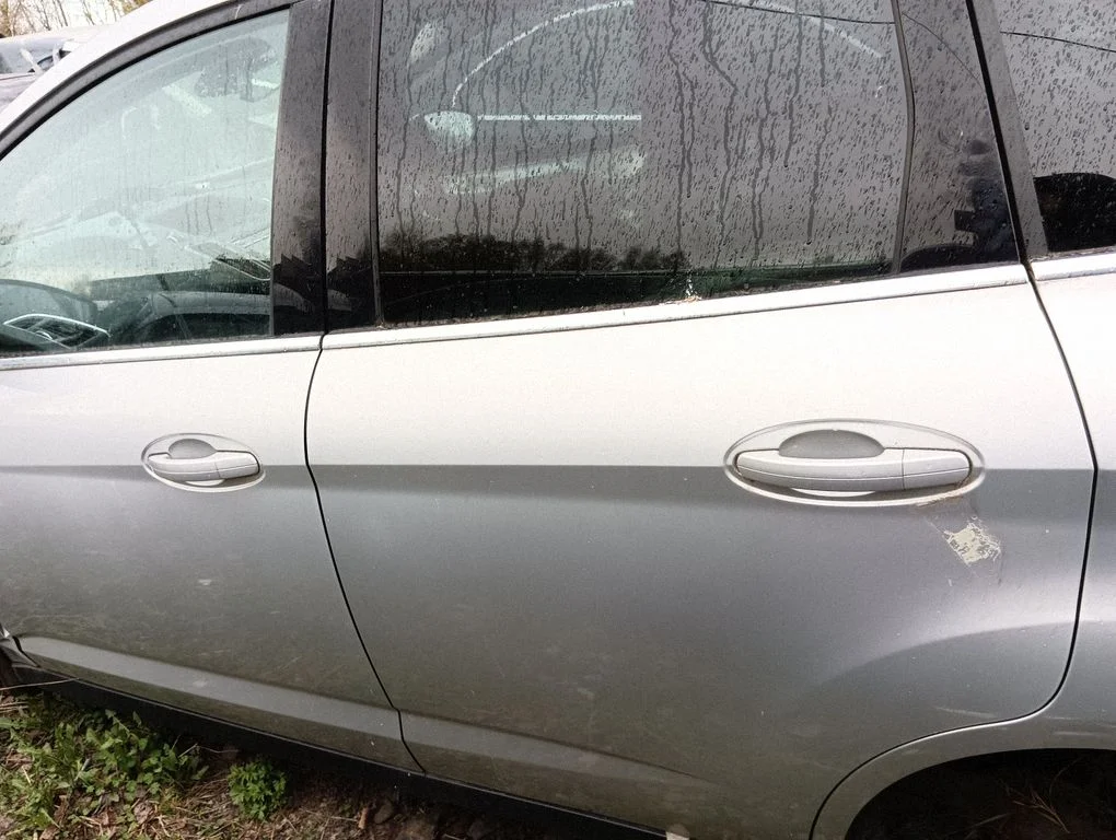 Rear door – left