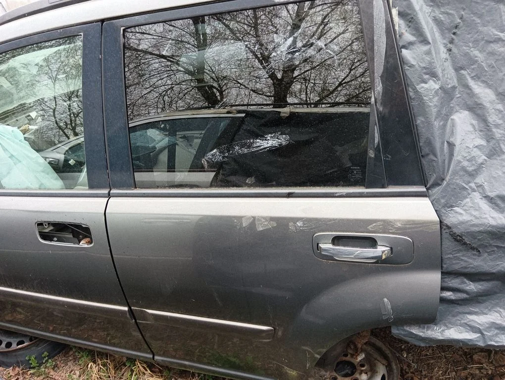 Rear door – left