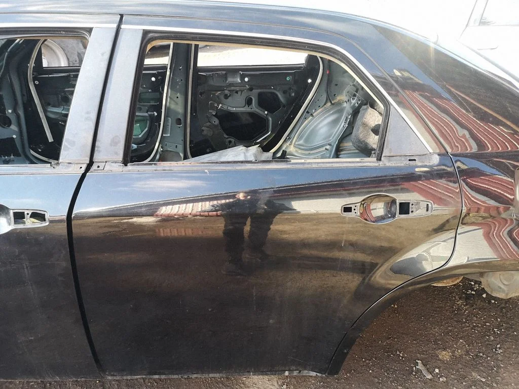 Rear door – left