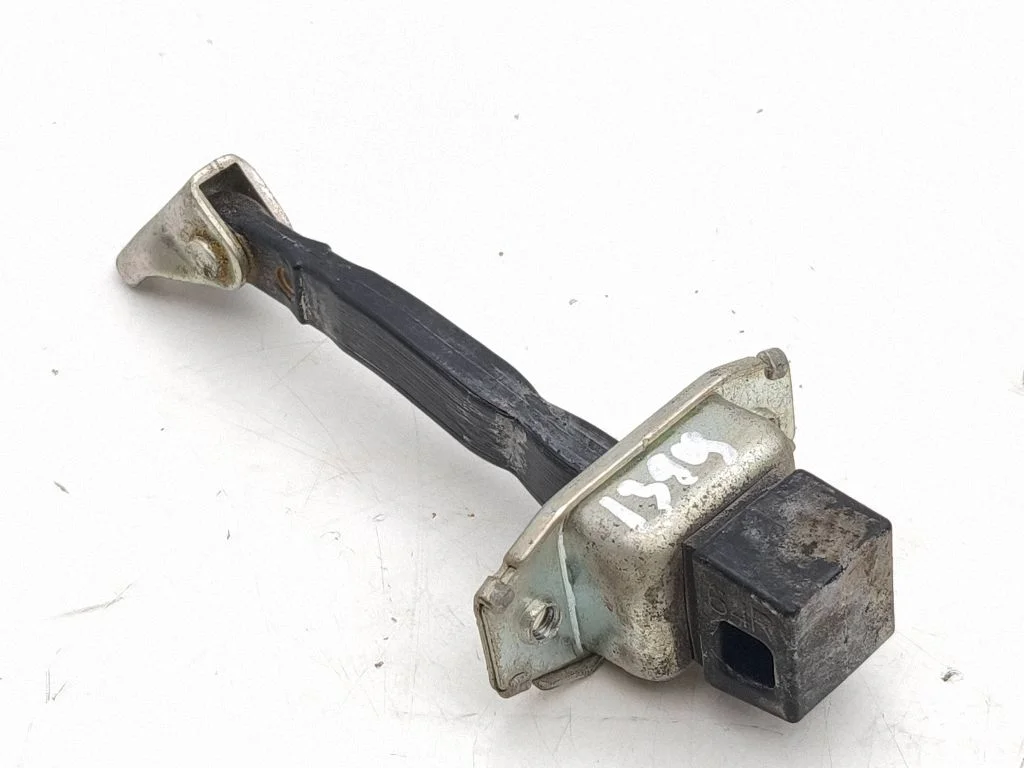 Rear door check strap stopper – left