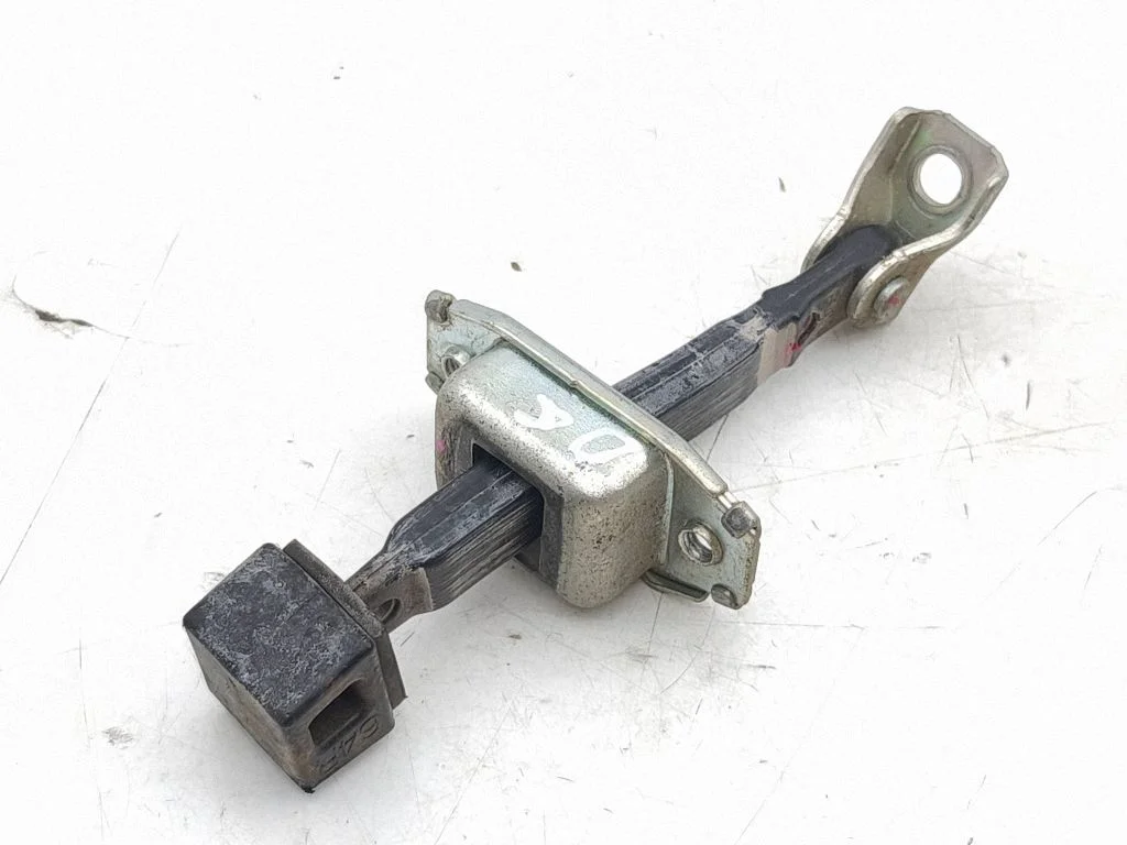 Rear door check strap stopper – right