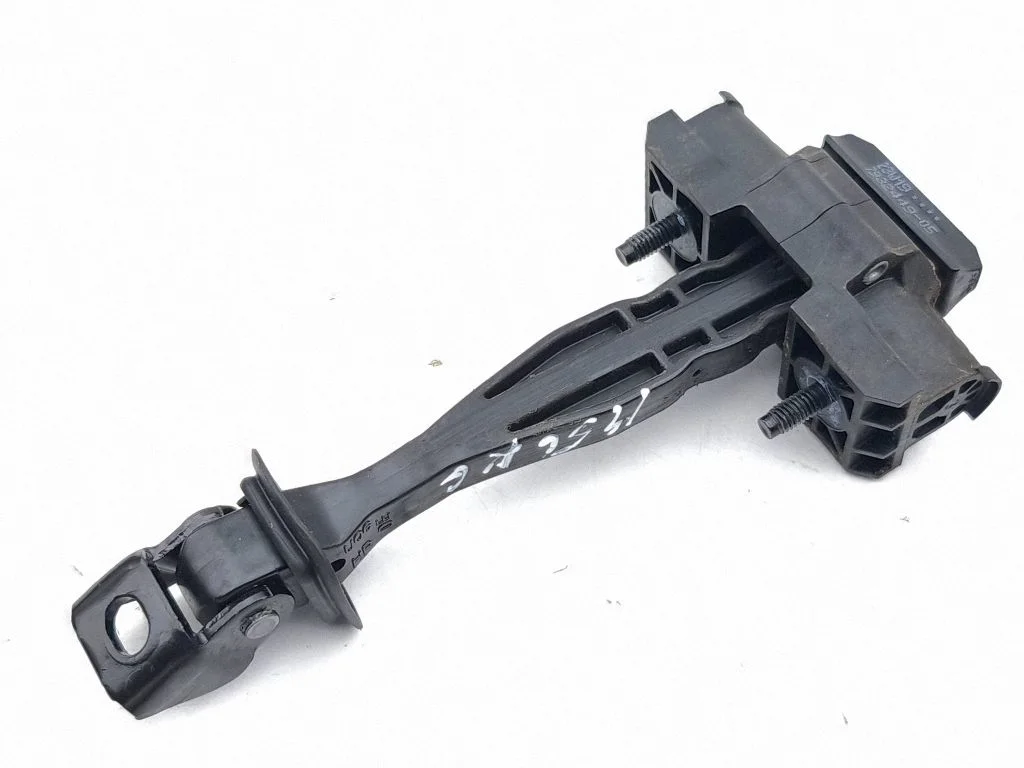 Rear door check strap stopper – left