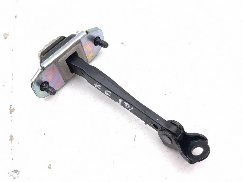 Rear door check strap stopper – left
