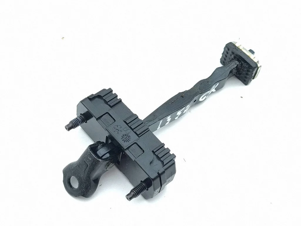 Rear door check strap stopper – left