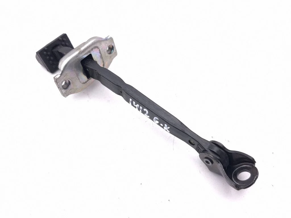 Rear door check strap stopper – left