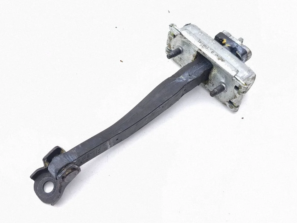 Rear door check strap stopper – right