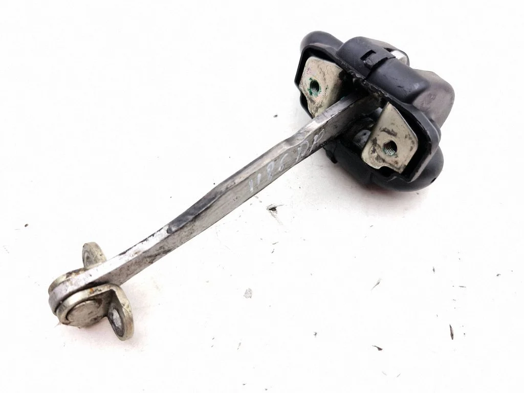 Rear door check strap stopper – right