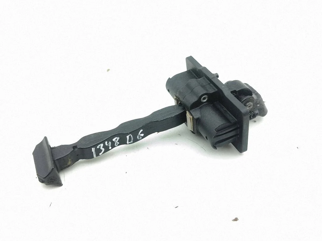 Rear door check strap stopper – right