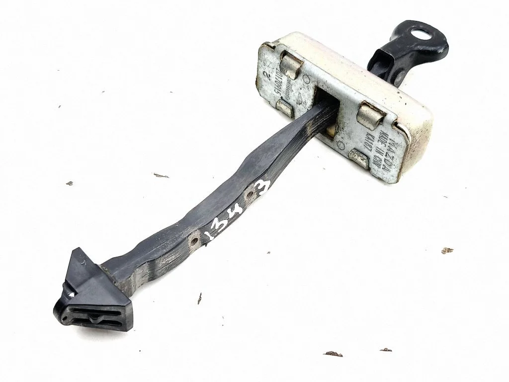 Rear door check strap stopper – Mazda CX-5 II (2017-2025)