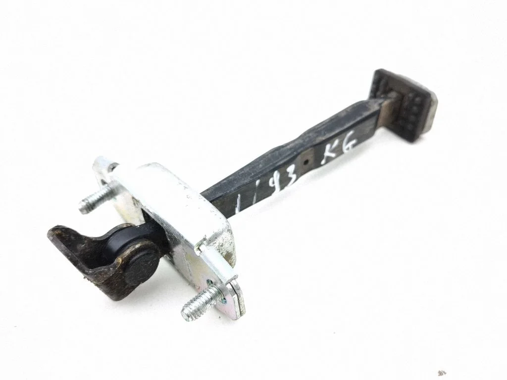 Rear door check strap stopper – left