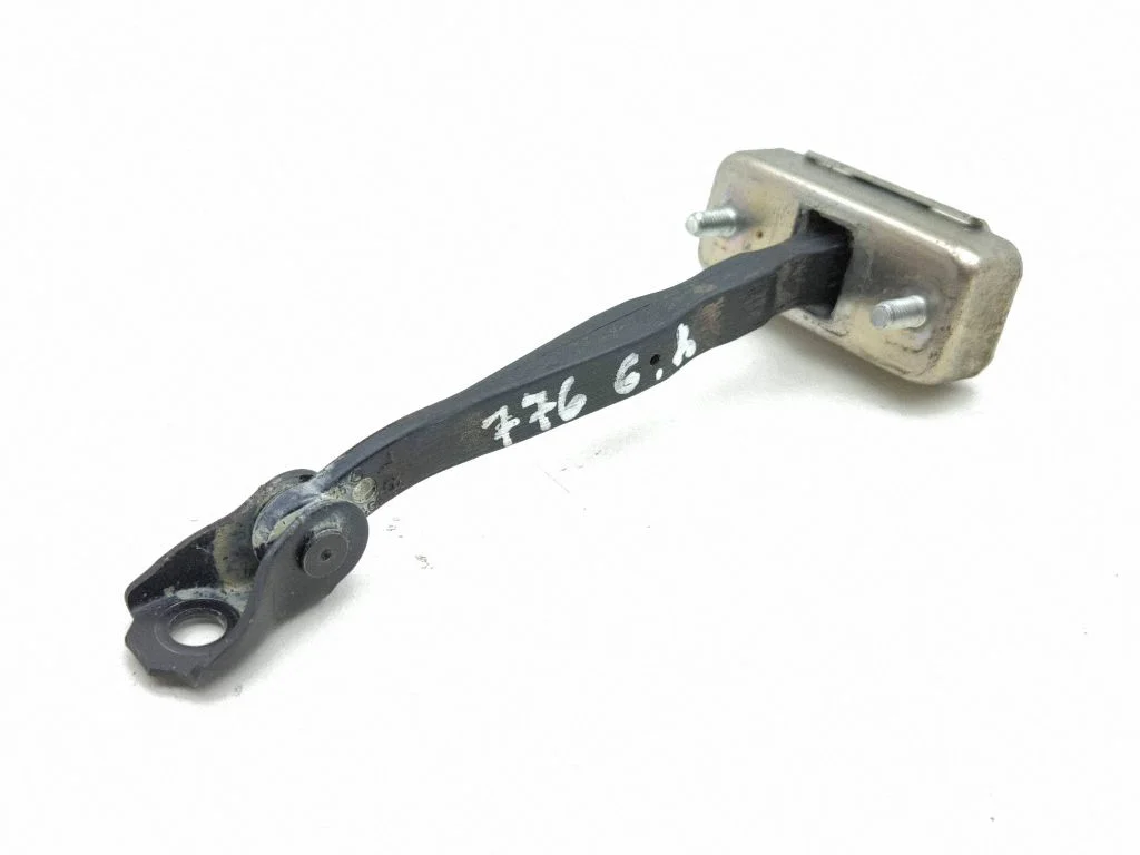 Rear door check strap stopper – left