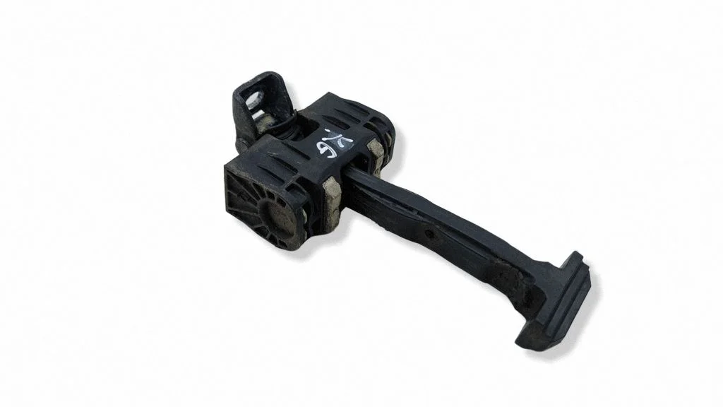Rear door check strap stopper – left