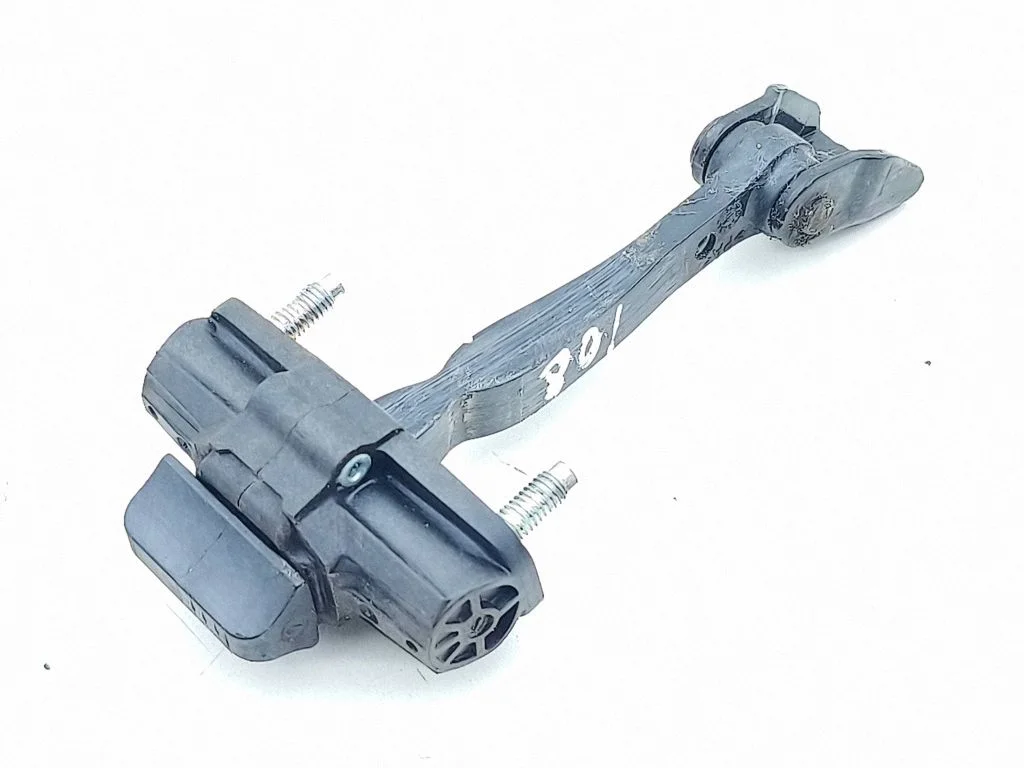 Rear door check strap stopper – left