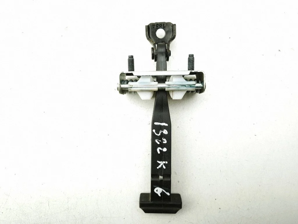 Rear door check strap stopper – left
