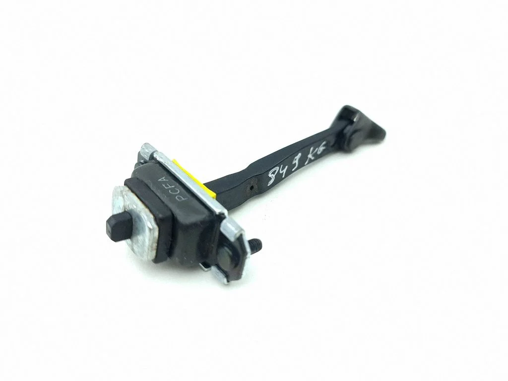Rear door check strap stopper – left