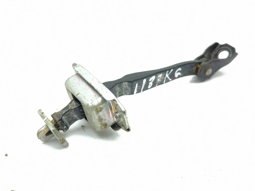 Rear door check strap stopper – left