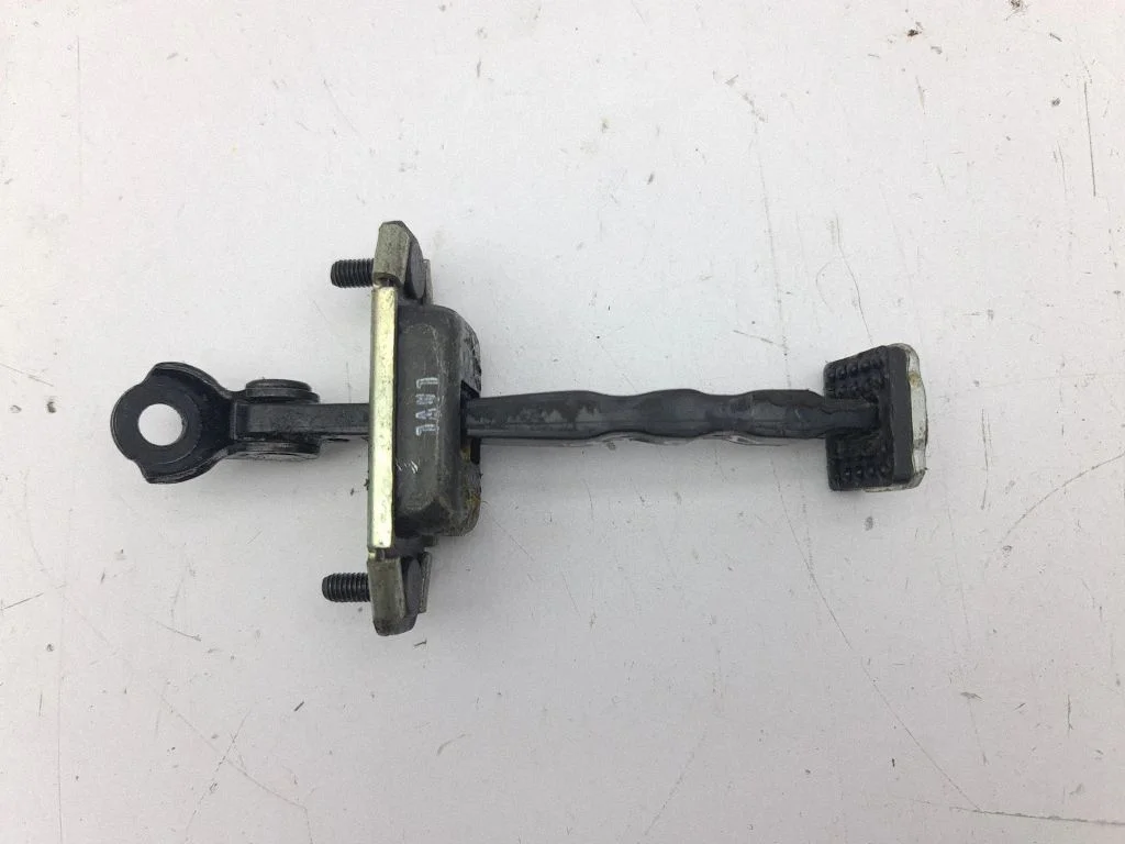 Rear door check strap stopper – right