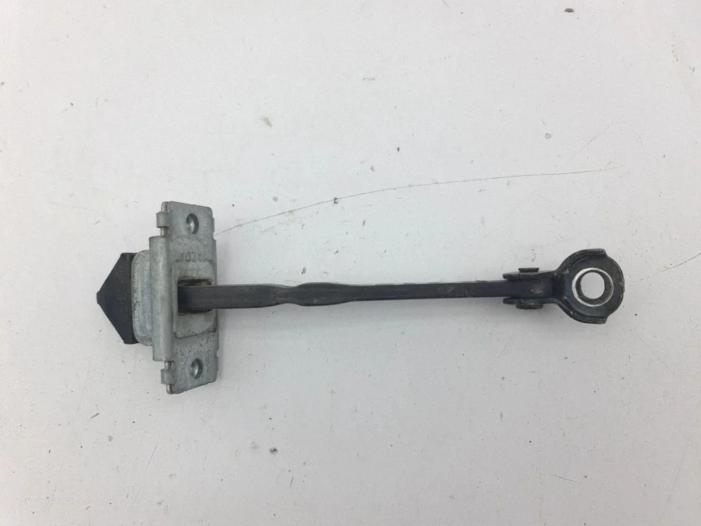 Rear door check strap stopper – right