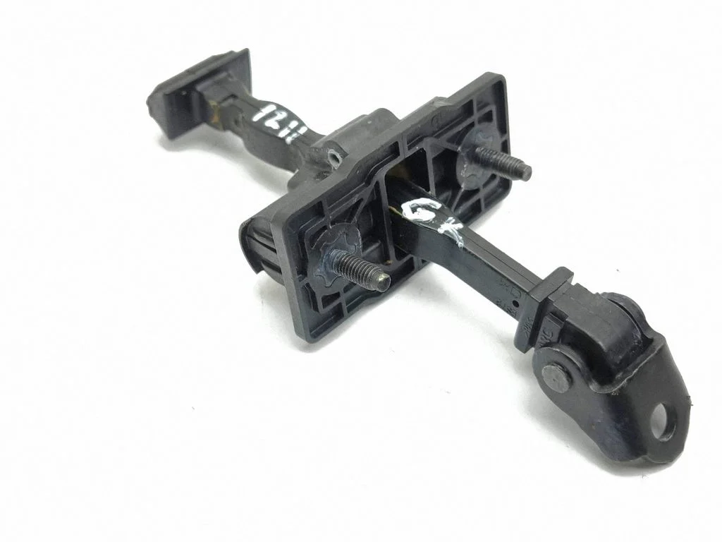 Rear door check strap stopper – left