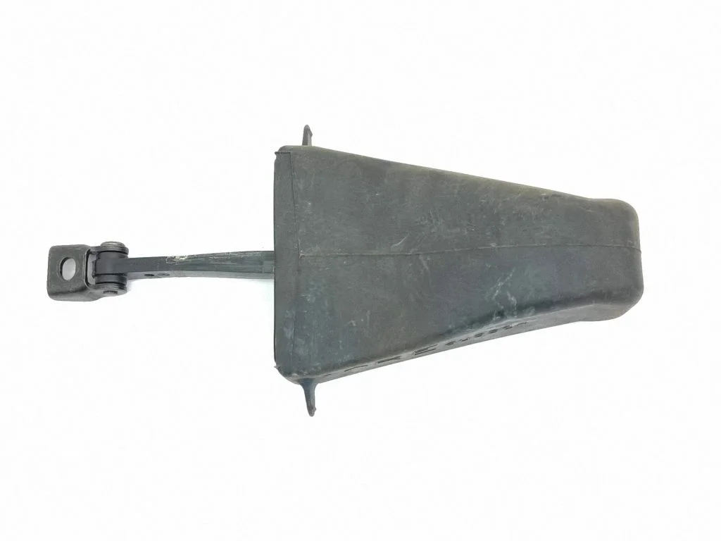 Rear door check strap stopper – left