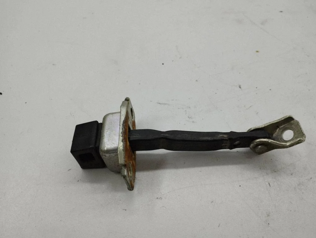 Rear door check strap stopper – right