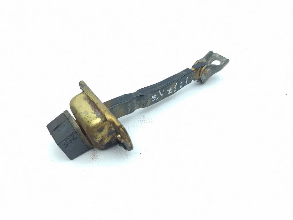 Rear door check strap stopper – left