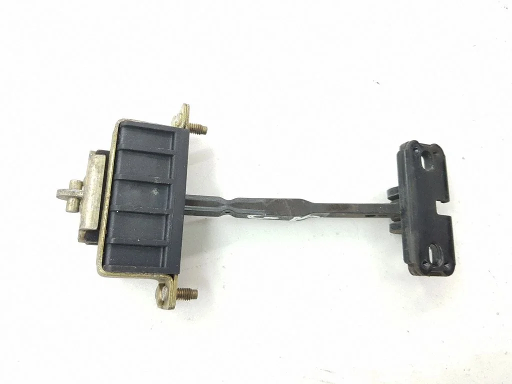 Rear door check strap stopper – left