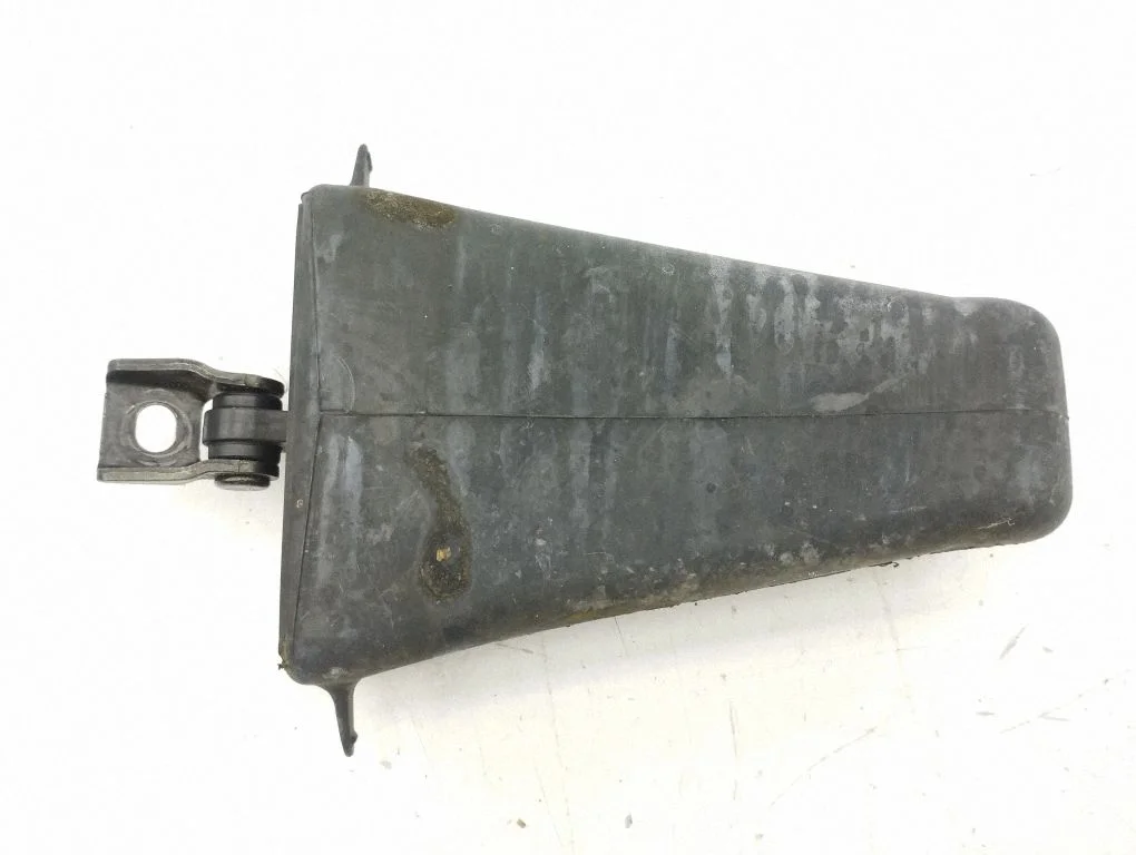 Rear door check strap stopper – left