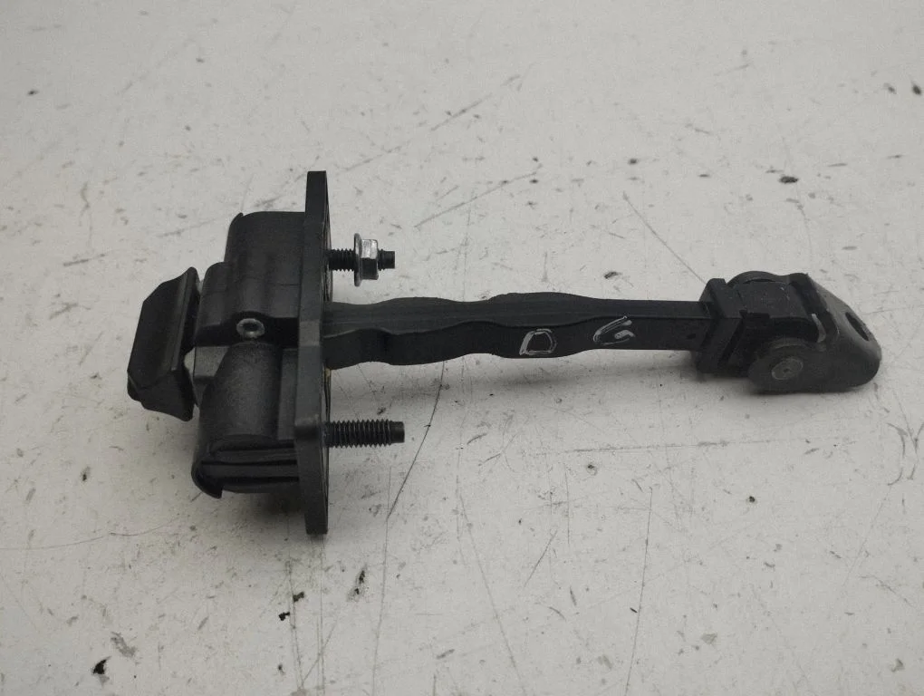 Rear door check strap stopper – right