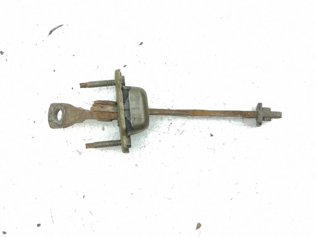 Rear door check strap stopper – right