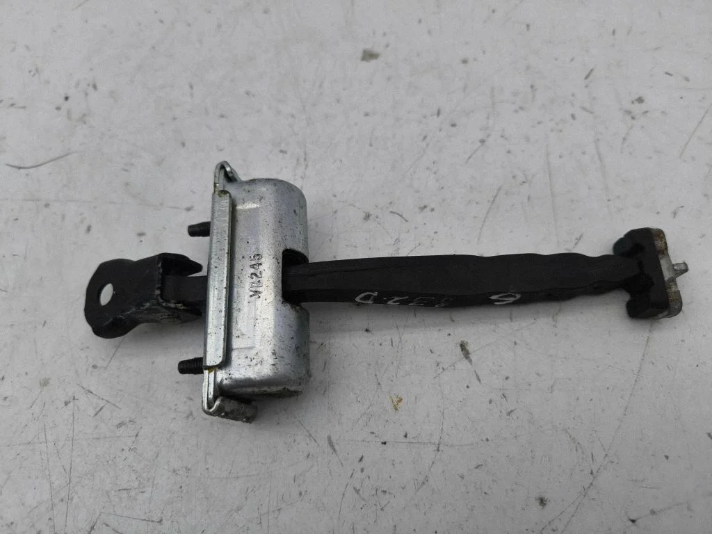 Rear door check strap stopper – right