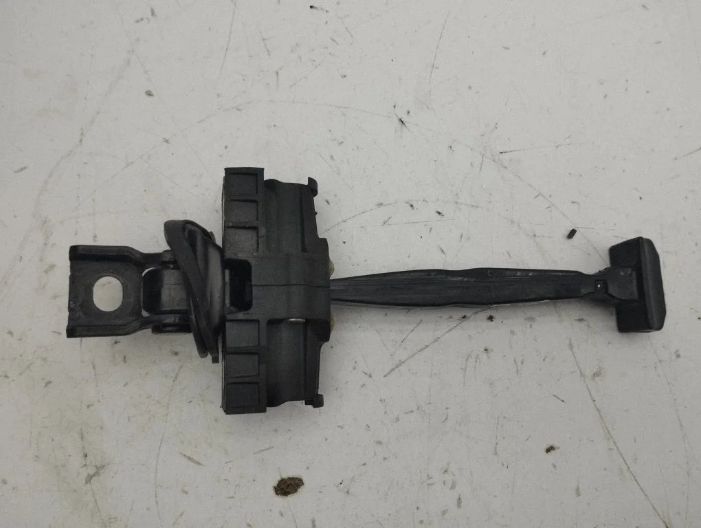 Rear door check strap stopper – right