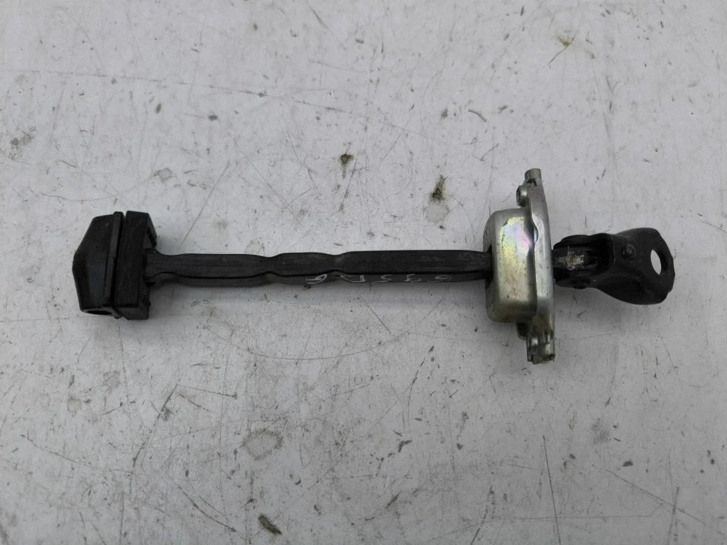 Rear door check strap stopper – right