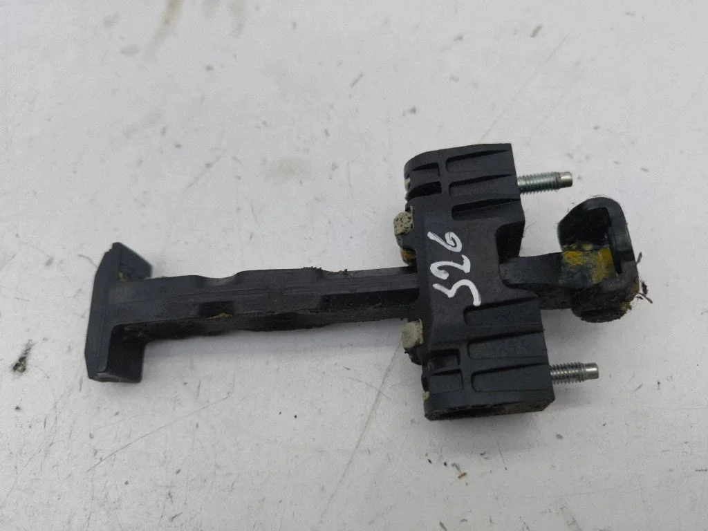 Rear door check strap stopper – right