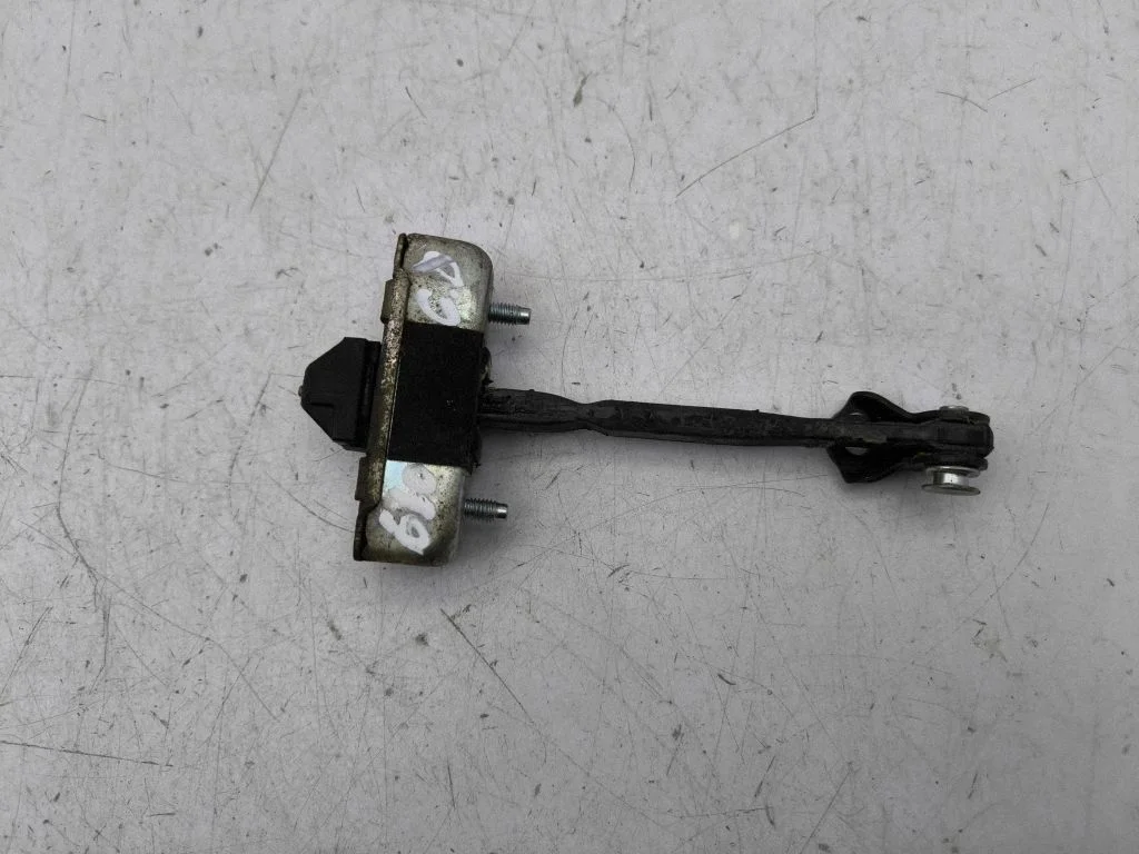 Rear door check strap stopper – rear right