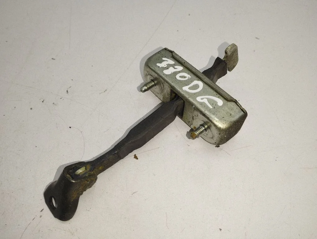 Rear door check strap stopper
