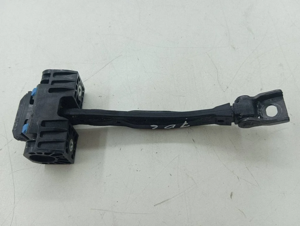 Rear door check strap stopper – right